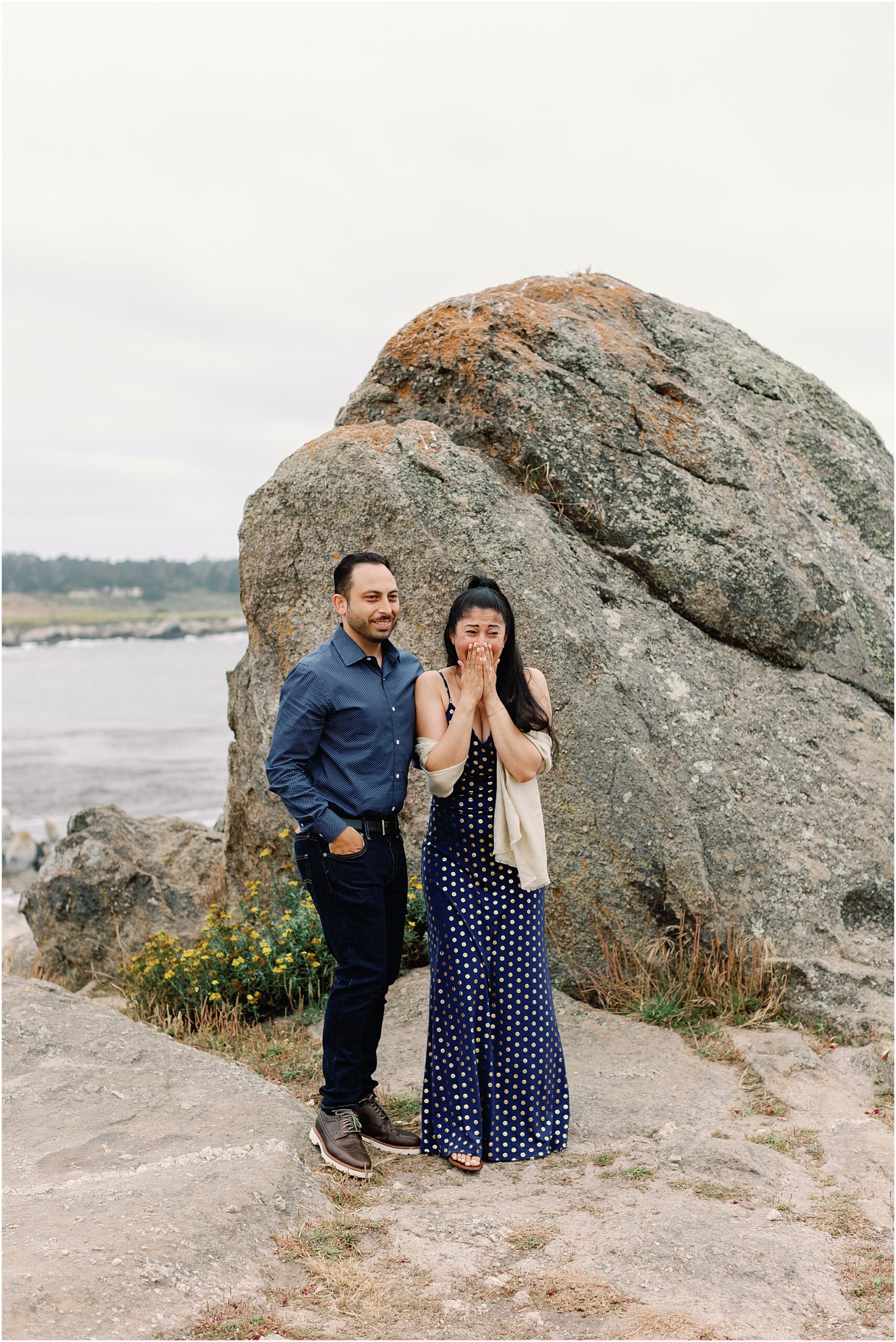 Michael helping Amanda steady herself after the emotional moment she realized her family witnessed the proposal.