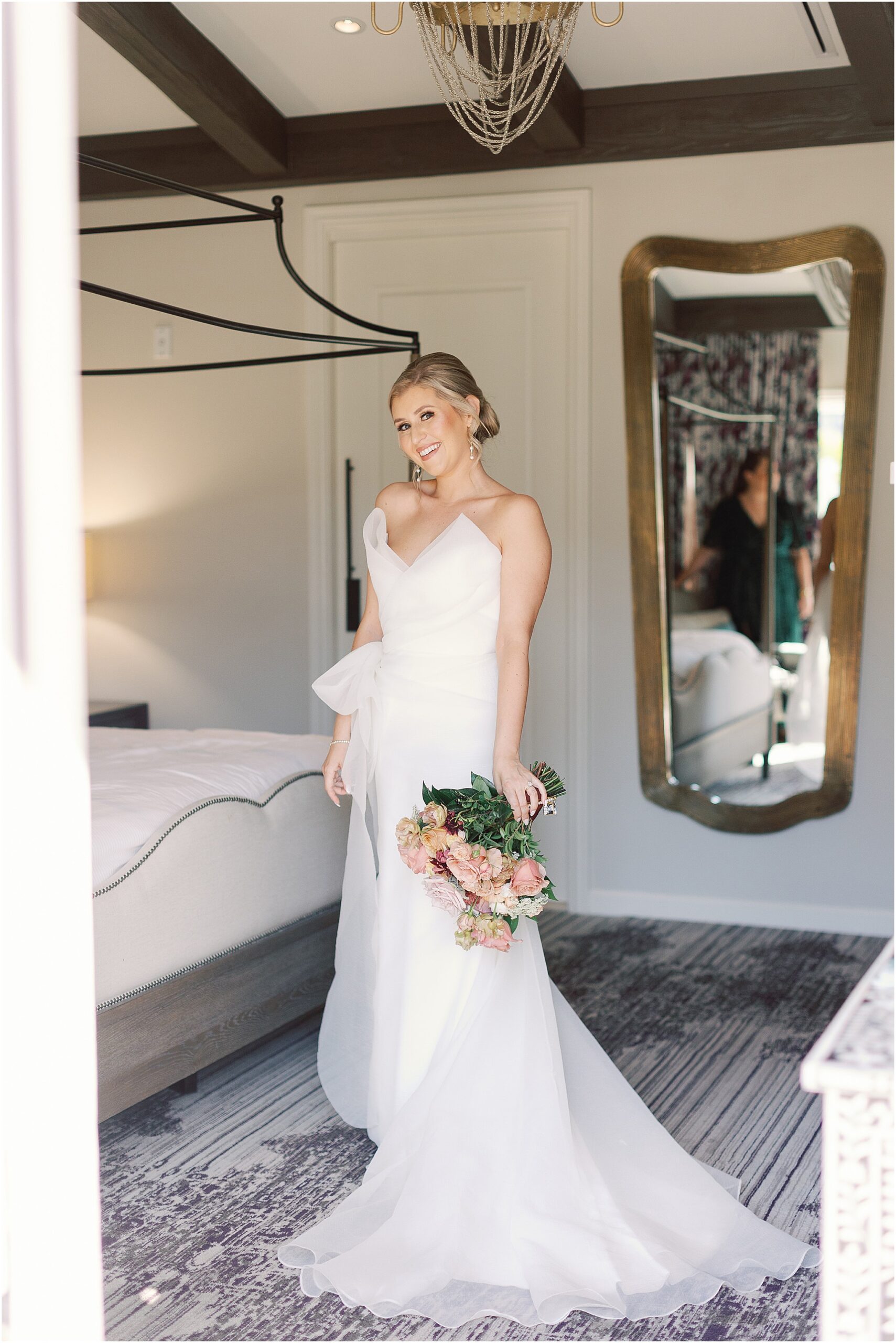 Bride glowing in a solo wedding portrait.