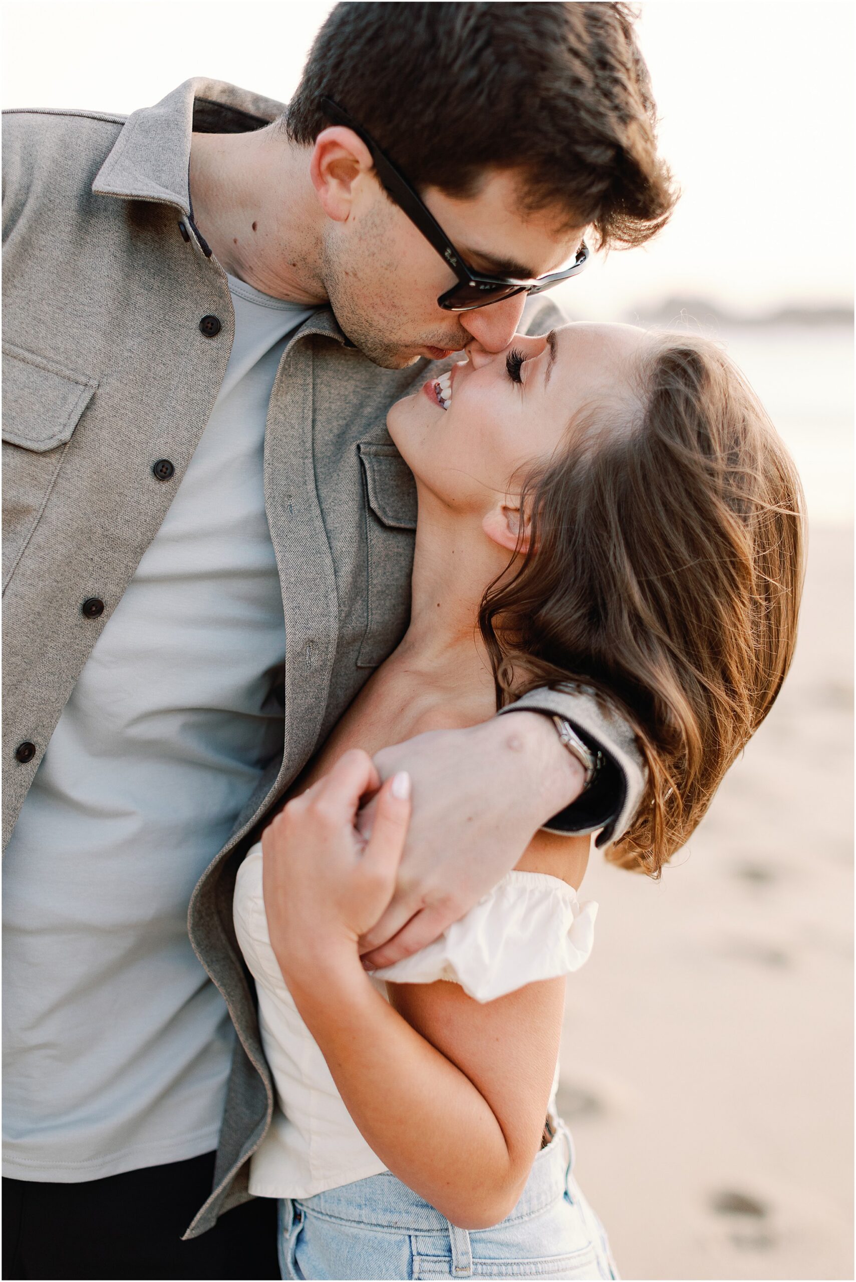 Joey kissing Jenny during their engagement session