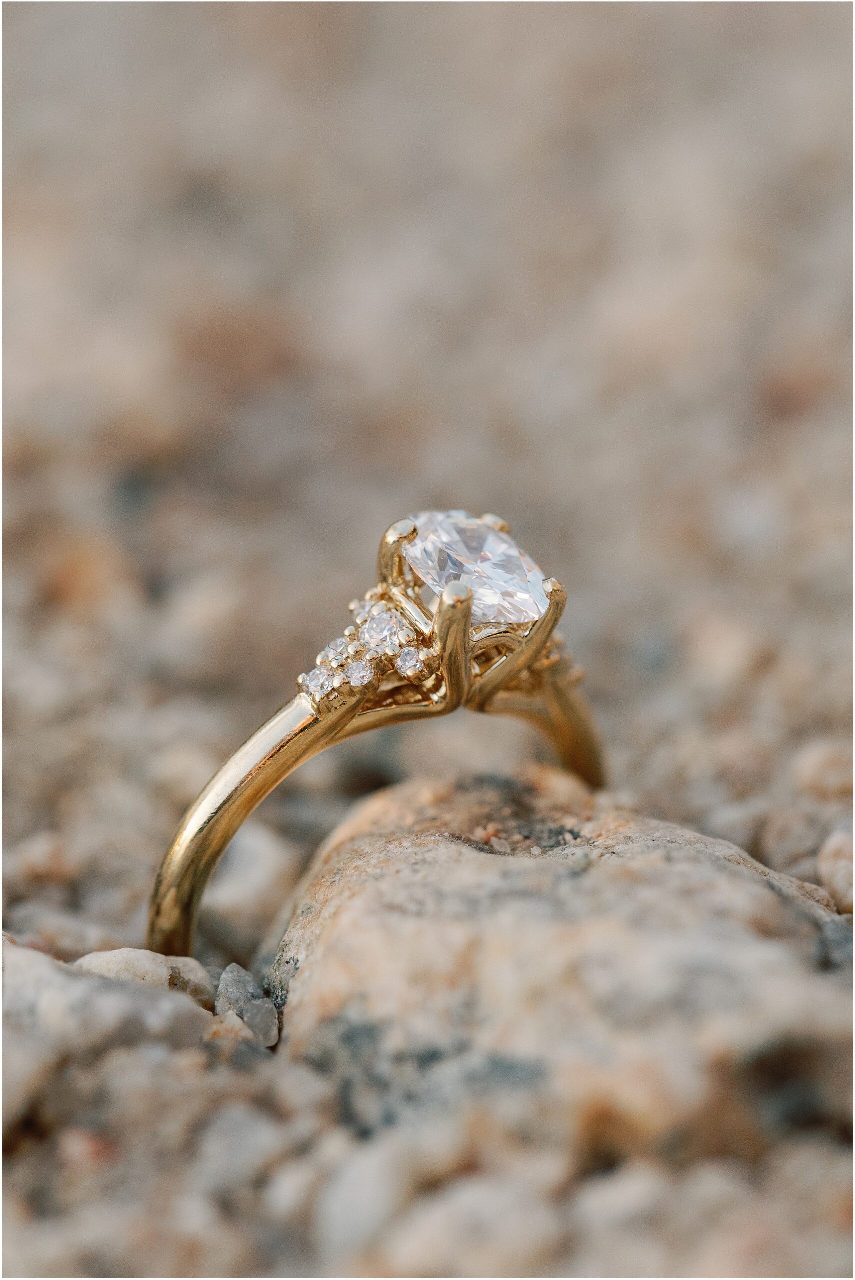 Engagement ring detail during Jenny and Joey’s coastal engagement session