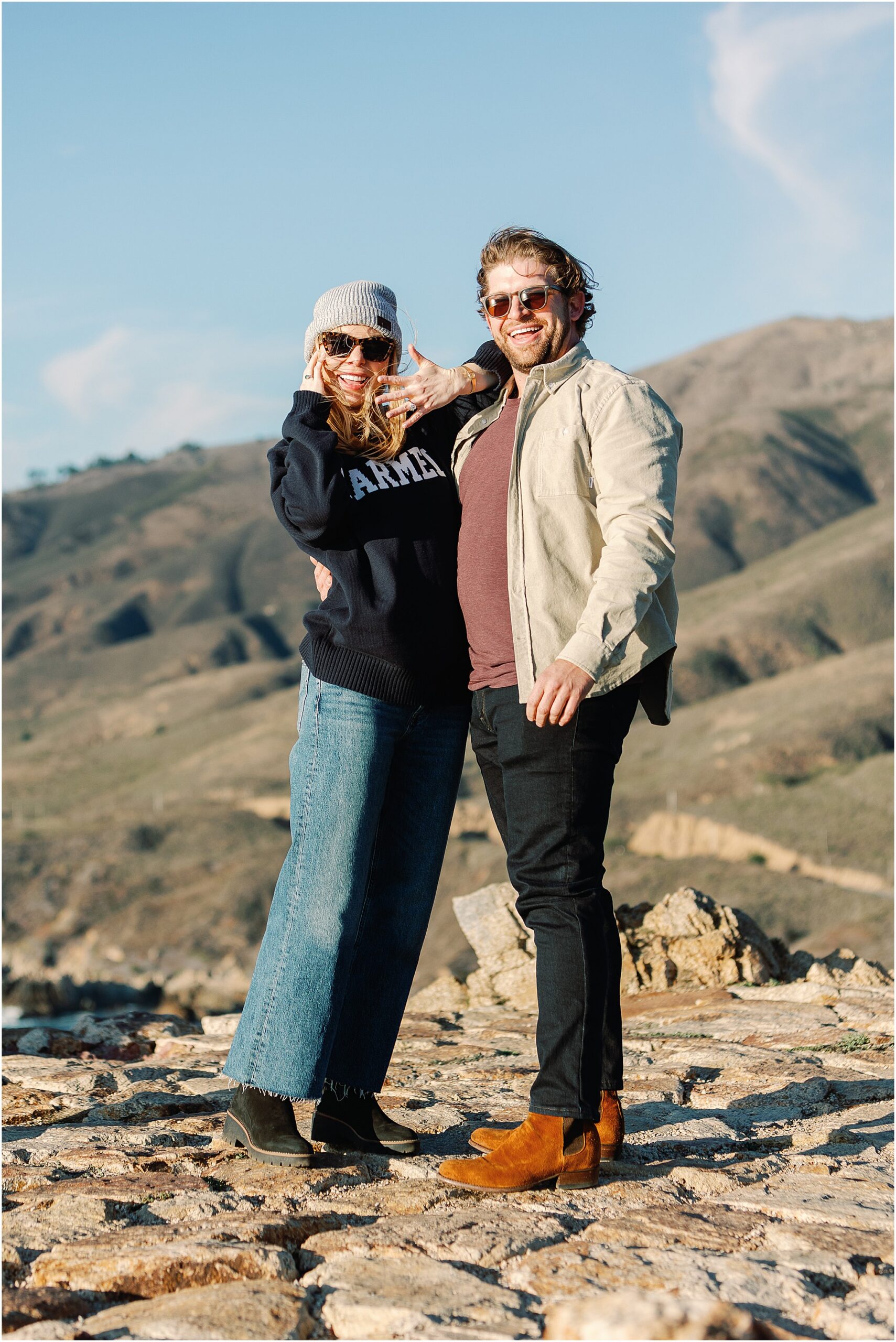 Newly engaged couple celebrating in Big Sur California.