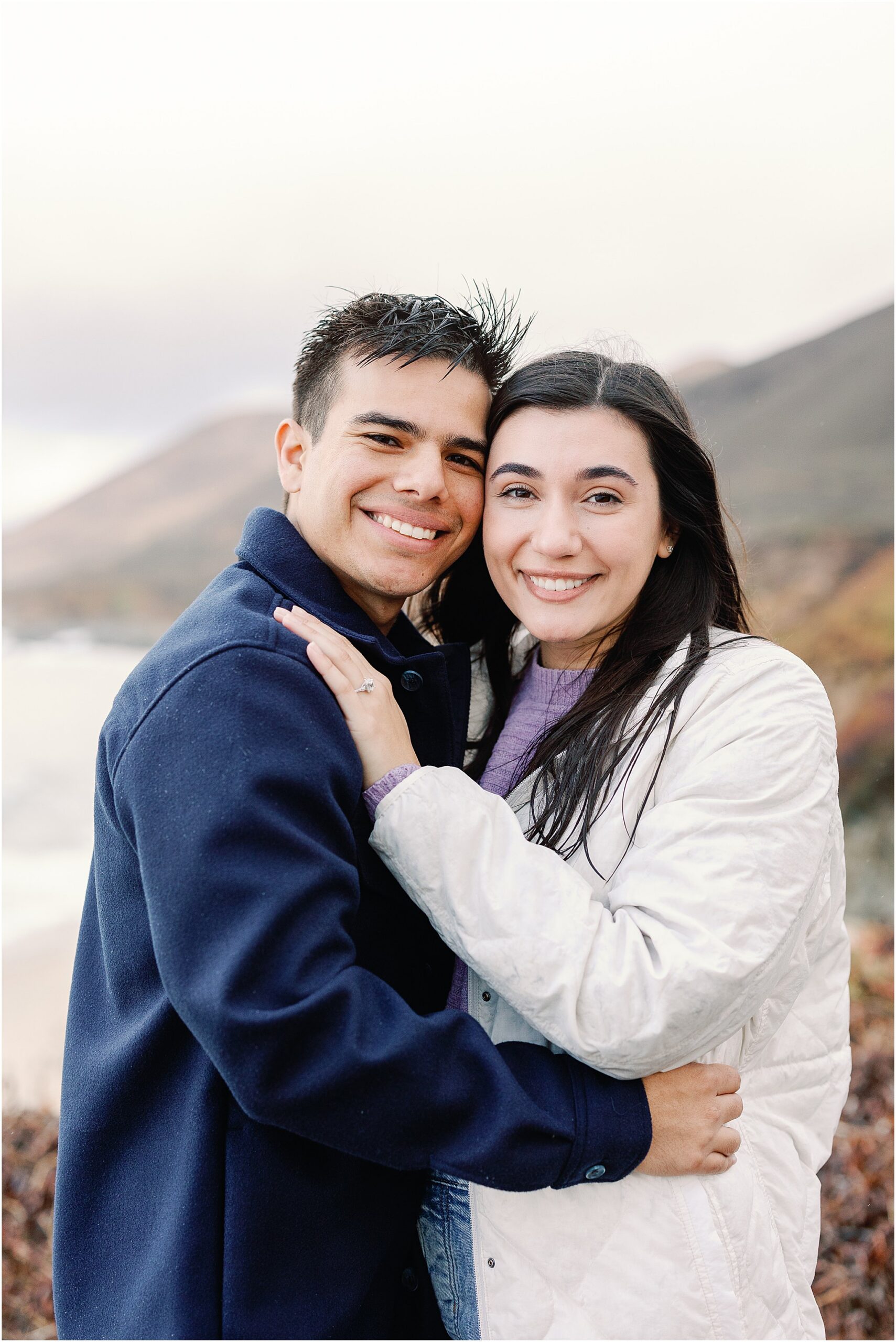 Scenic Big Sur cliff bride and groom portraits during romantic proposal session.