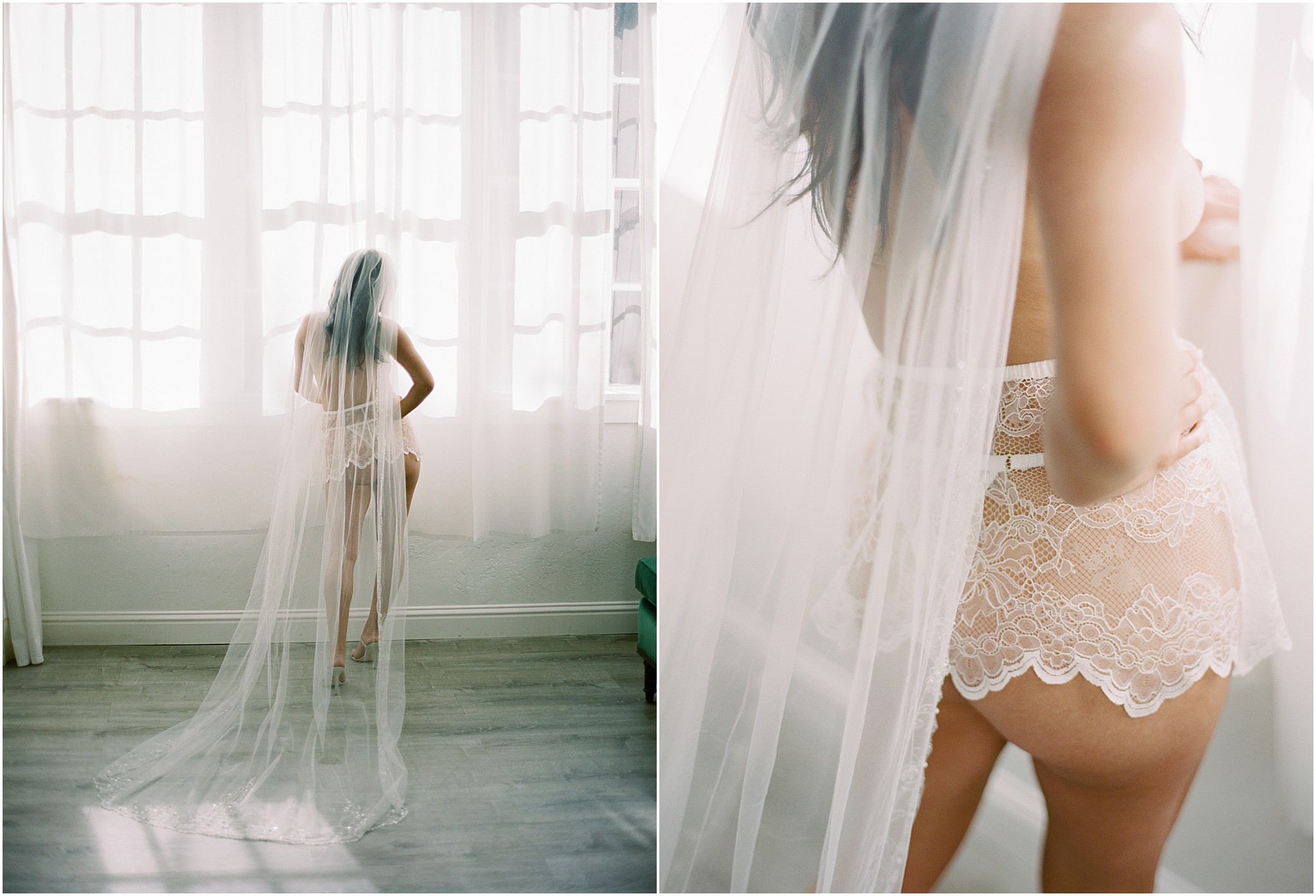 Woman standing by a window wearing a sheer veil and lace outfit, backlit by soft natural light.