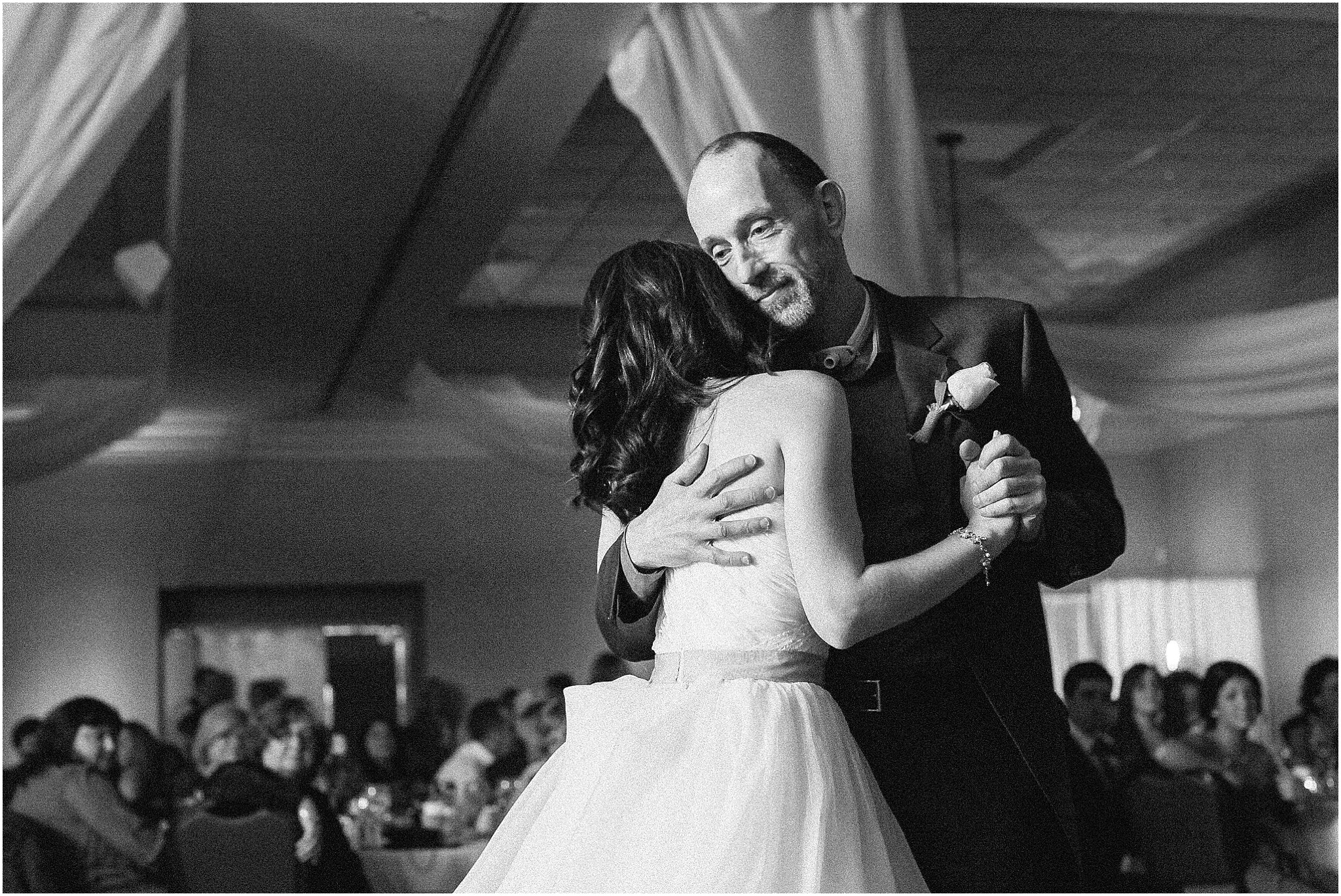 Bride and father sharing dance in elegant ballroom during Philadelphia wedding reception