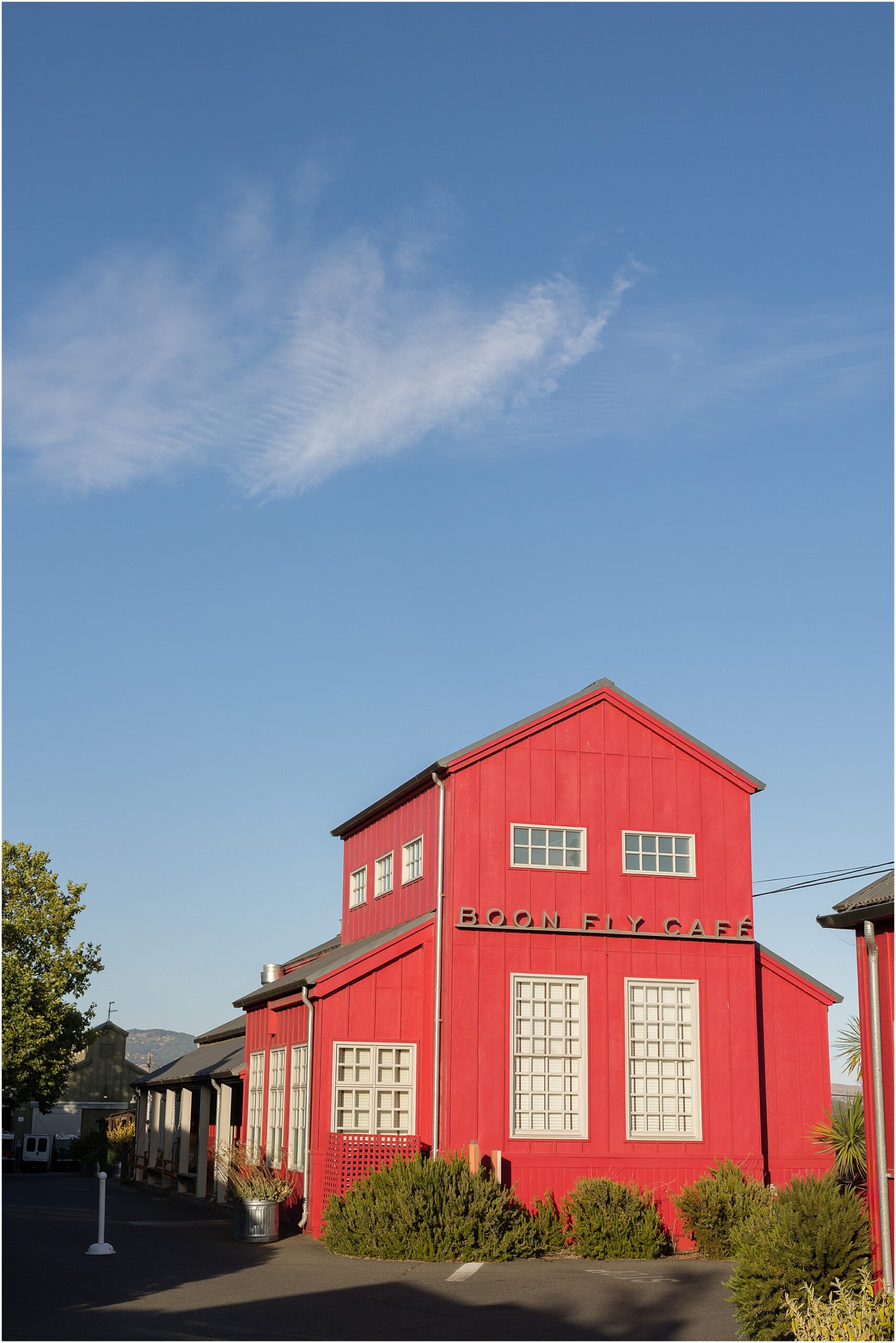 Napa Valley venue exterior at golden hour with warm sunlight.